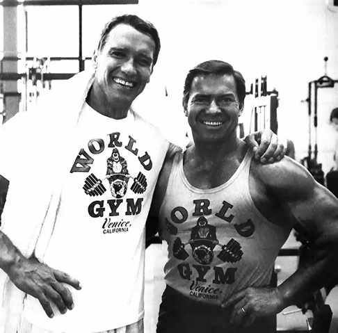 Larry Scott y Arnold Schwarzenegger